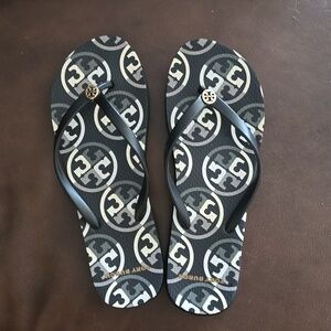 Tory Burch size 9 flip flops.
